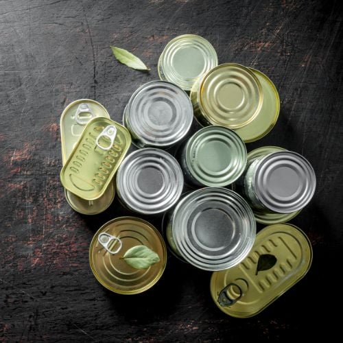 Closed cans of canned dog food